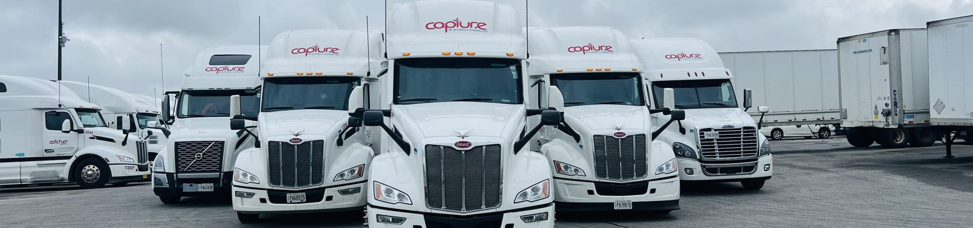 Capture Logistics tractor-trailer at dusk